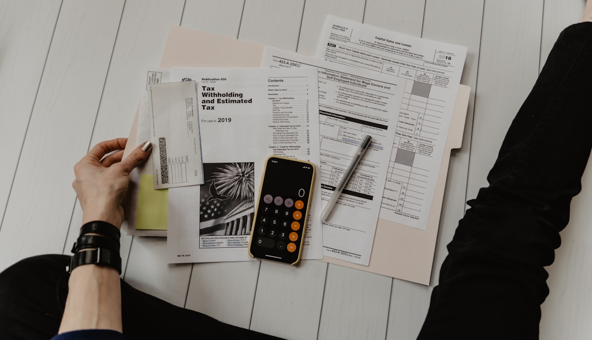 Mortgage paperwork and financial documents on a desk